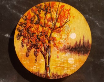 Handpainted Wooden Fridge Magnet of an Orange Tree by a Sunlit Lake and Distant Island