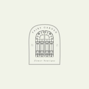 May include: Black and white line art illustration of a wrought iron gate with an arched top. The gate is labeled "Fairy Garden Flower Boutique" and "Est. 1980".