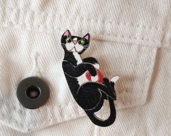Playful tuxedo cat brooch. Hand painted wooden pin badge.