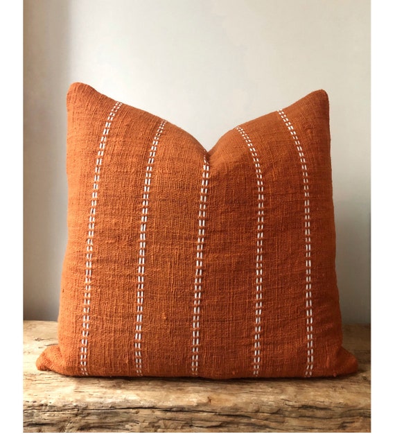 Large Burnt Orange Pillow with stitch 