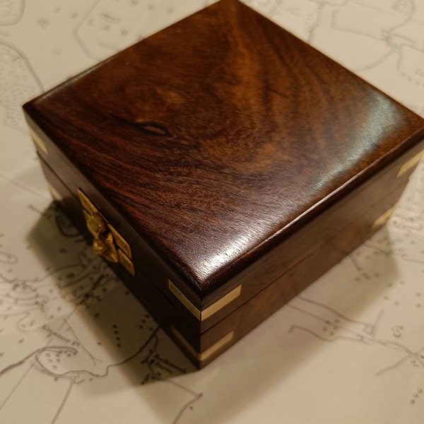 Wooden box with brass inlay for compass