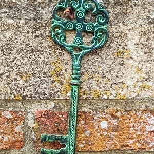 Vintage bronze and verdigris large key