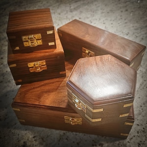 Wooden boxes with brass inlay, various sizes and shapes