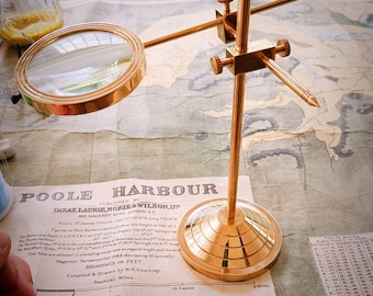 Brass Magnifier on a Stand.