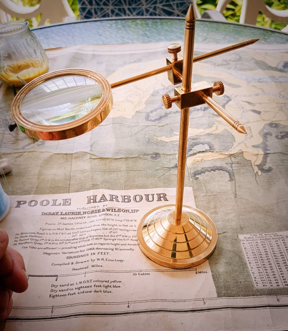 Brass Magnifier on a Stand.