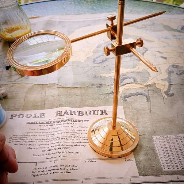 Brass Magnifier on a Stand.