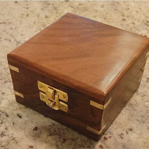 Wooden box with brass inlay for compass