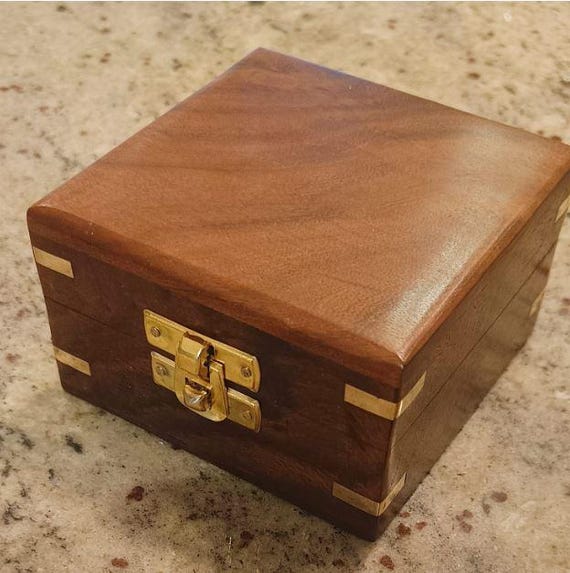 Wooden box with brass inlay for compass