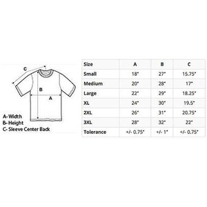 May include: A size chart for a t-shirt with measurements in inches for width, height, and sleeve center back. The chart includes sizes from small to 3XL and a tolerance of +/- 0.75 inches for width and sleeve center back, and +/- 1 inch for height.