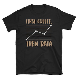May include: Black t-shirt with a brown graphic of a line graph and the text "First Coffee, Then Data".