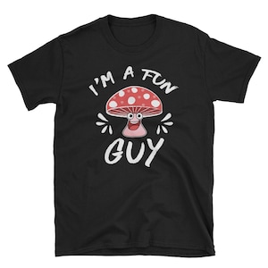 May include: Black t-shirt with a white graphic of a smiling mushroom with red and white spots. The text "I'm a Fun Guy" is written in white.