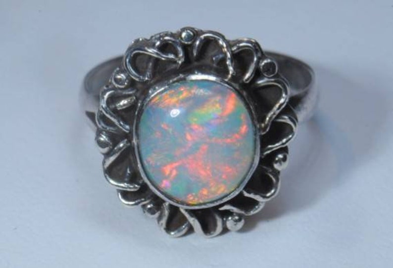 Well opal ring and pendant set