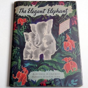 ELEGANT ELEPHANT Slottie Toy Book, 1st Edition in dust jacket, toy present and unpunched