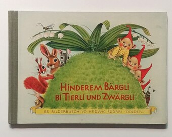 Wordless picture book, HINDEREM BARGLE Bi TIERLIE und Zwargli, published in Switzerland, circa 1950