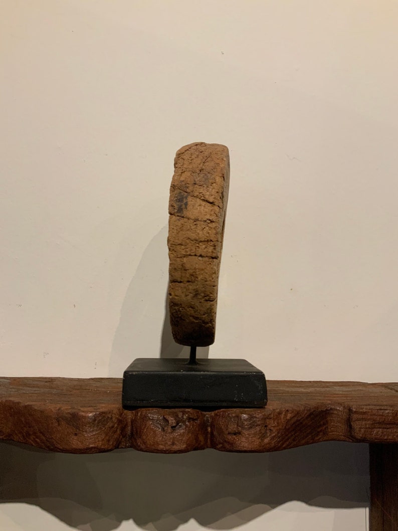 Antique Hand carved Teak wheel from Indonesia.