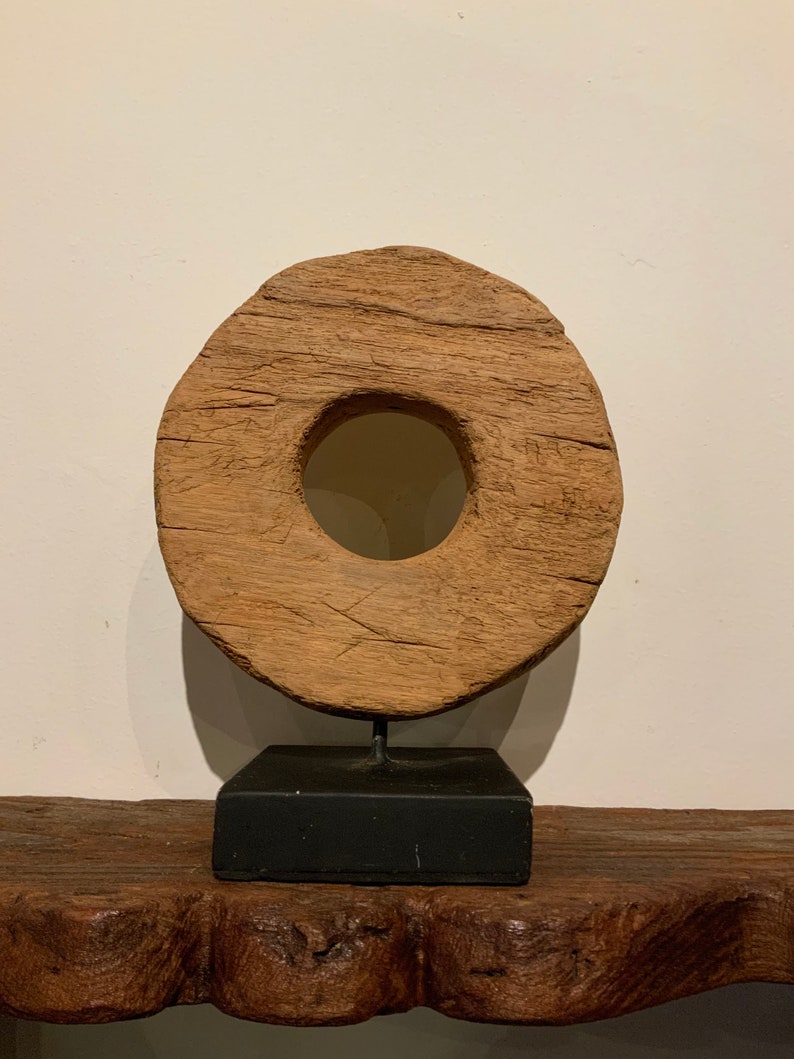 Antique Hand carved Teak wheel from Indonesia.