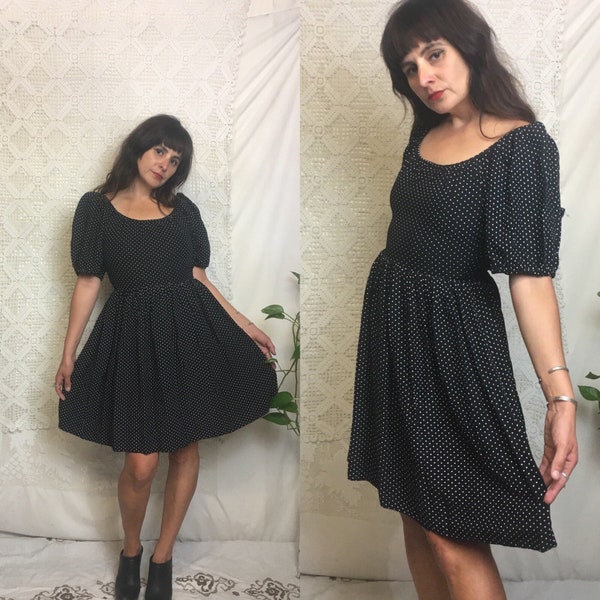 Super cute 1970’s puff sleeve black and white polka dot flare dress