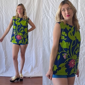 Vintage 1960’s floral tunic with embroidered flower