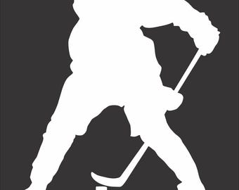 May include: A white silhouette of a hockey player in action against a dark gray background. The player is bent over, stick in hand, poised to strike the puck. The image captures the dynamic movement of the sport.