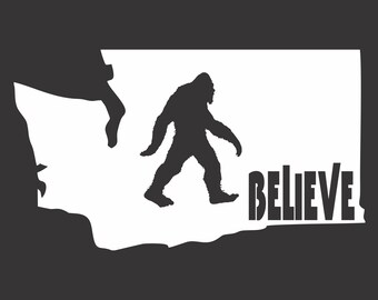 May include: A black and white silhouette of Bigfoot walking across the state of Washington. The word "BELIEVE" is written below Bigfoot.