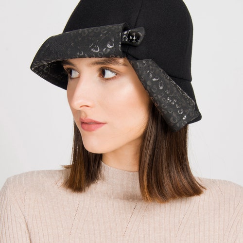 Black assymetrical cloche hat with print detail shops