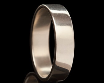 Solid silver ring, polished, handmade by Nathan Walker