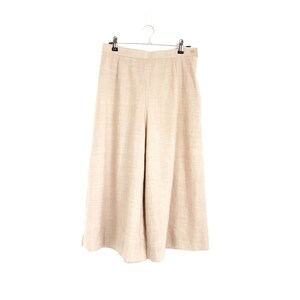 Women knitted beige set with palazzo pants and wrap knitted top