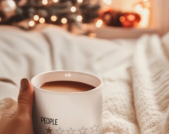 May include: White coffee mug with the text "PEOPLE" and a one-star rating. The text below the rating reads "Total nightmare, would not recommend."