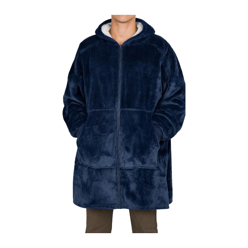 May include: A navy blue zip-up hoodie made of a plush, fuzzy material. The garment features a hood lined with a white, sherpa-style fabric, long sleeves with ribbed cuffs, and two large, square patch pockets on the front of the torso.