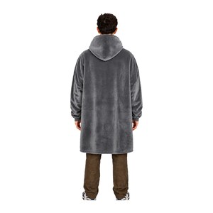 May include: An oversized, charcoal gray hooded sweatshirt made of a soft, plush fleece material. The garment features long sleeves with ribbed cuffs, a large integrated hood, and a loose, relaxed fit that extends to the mid-thigh area.