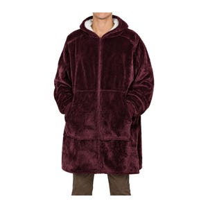 May include: A deep burgundy zip-up hooded jacket made of a plush, fuzzy material. The garment features a full-length front zipper, a hood lined with white faux shearling, long sleeves with ribbed cuffs, and two large patch pockets on the front.