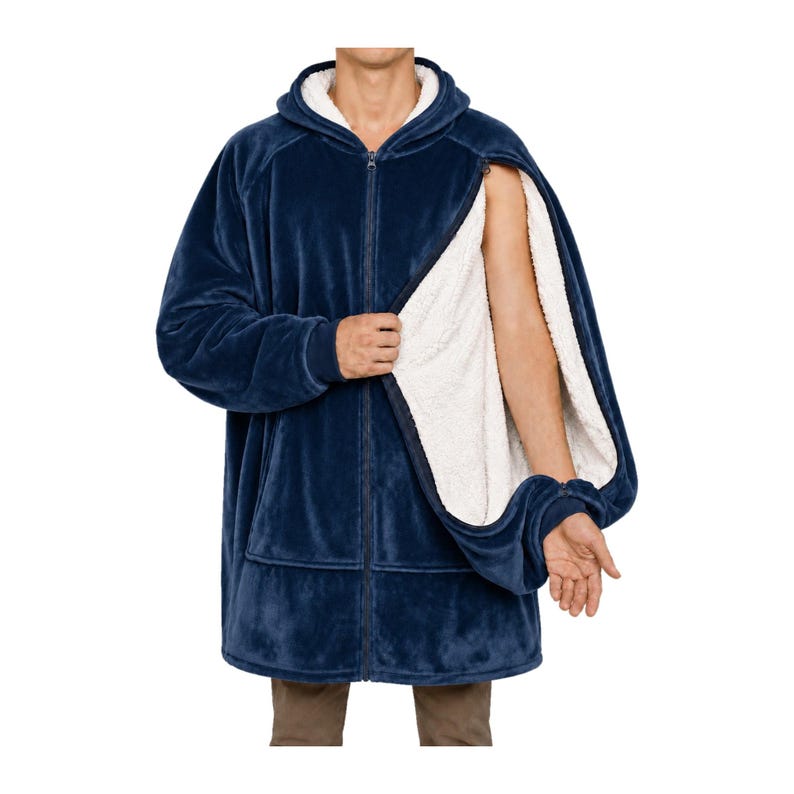 May include: A navy blue zip-up hoodie with a white sherpa fleece lining. The garment features a full-length front zipper, a hood, and long sleeves. The side panel is partially unzipped, revealing the white textured interior lining of the hoodie.