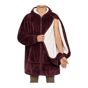 May include: A deep burgundy zip-up hooded sweatshirt featuring a plush white sherpa fleece lining. The garment has long sleeves with ribbed cuffs, a full-length front zipper, and a large front pocket. The side panel is open to reveal the interior.