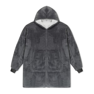 May include: A dark gray zip-up hooded sweatshirt made of plush fleece material. The garment features a white sherpa-style lining inside the hood, long sleeves with ribbed cuffs, and two large front pockets positioned on either side of the zipper.