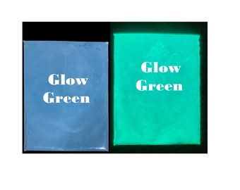 May include: Two samples of glow in the dark paint. One sample is a light blue color and the other sample is a bright green color. Both samples have the text "Glow Green" written on them.