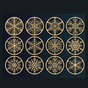 May include: Twelve gold snowflake designs on a dark blue background. Each snowflake is unique and intricate.