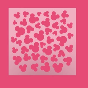 K&ouml;nnte beinhalten: Rosafarbene Schablone mit einem sich wiederholenden Muster von Mickey-Maus-K&ouml;pfen.