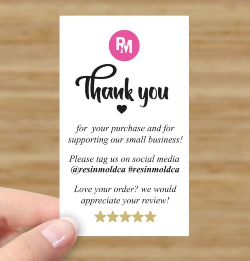May include: Thank you card with a pink circle containing the letters RM. The card says "Thank you" with a black heart below the text. The card also says "for your purchase and for supporting our small business! Please tag us on social media @resinmoldca #resinmoldca Love your order? we would appreciate your review!" with five gold stars below the text.