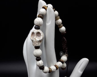 The Howlite Skull Bracelet made of pure high quality Tiger's Eye, Howlite (Skull and beads) and Silver