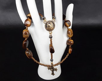 One Decade Catholic Rosary made of Tigers Eye Miyuki Seed Beads a Gothic stainless vintage Pewter Cross and a medal of our Virgin Mary