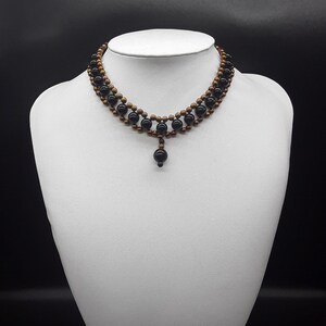 The Black Pearl Choker Necklace made of Triple-A high quality Black Onyx, Hematite and Stainless Steel.