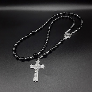The Dark Night Catholic Rosary made of Black Onyx, Hematite and pure 925 Silver - designer Cross; and a 925 Silver our Holy Mother medal.