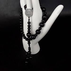 One Decade Catholic Rosary made of Pure Black Onyx gemstones, a Black Onyx Cross and a silver stainless Steel medal of St Benedict.