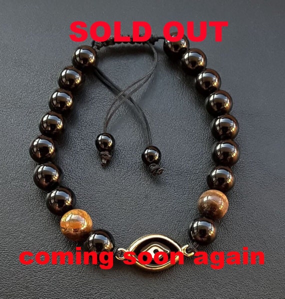 Hecate's Eye Charm Bracelet, Reiki Charged and Energy Infused Bracelet, made of Black Onyx and Tigers Eye, protects against the Evil Eye