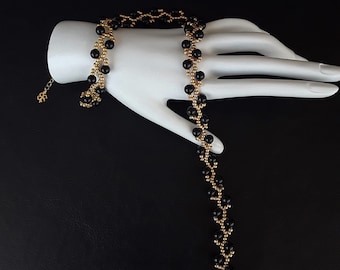 The Golden Dawn Sun Bracelet and Choker Jewelry Set made of Black Onyx, 18K Gold and MIYUKI Seed Beads