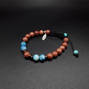 The Healing Energy Chakra Bracelet (Ver. 1) made of High quality gemstones of Crysolite, Hematite and Agate.