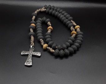 The Dark Military 550 Paracord 5 Decade Rosary made of Volcanic Lava stone, Natural Wood, a Stainless Silver Cross with the uncharted symbol
