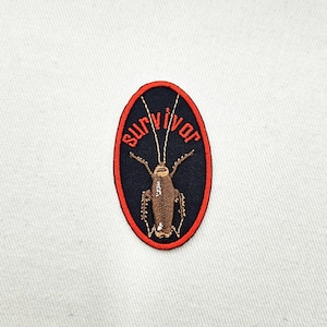 Överlevande kackerlacka insekt broderi stryk-på lapp