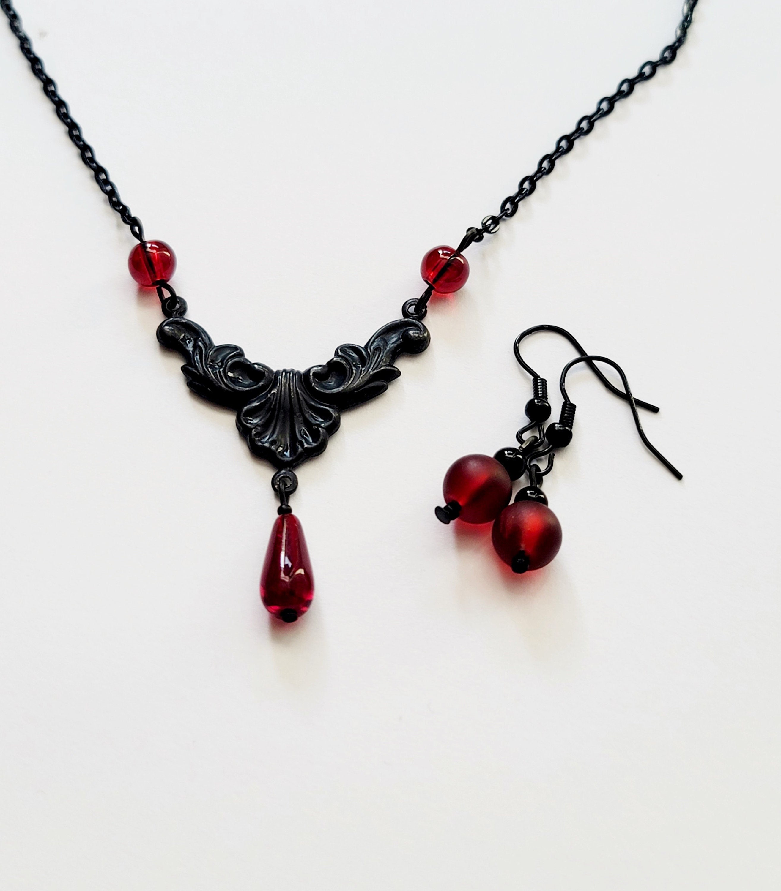 Black Spinel Necklace with 8mm Faceted Ruby Bead