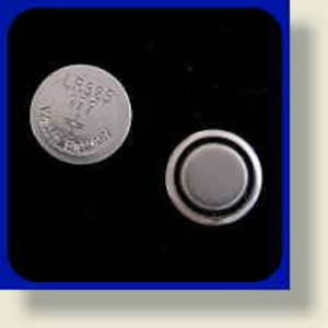 May include: A silver watch battery with the text "LR626 1.5V Made in Taiwan" on the top.